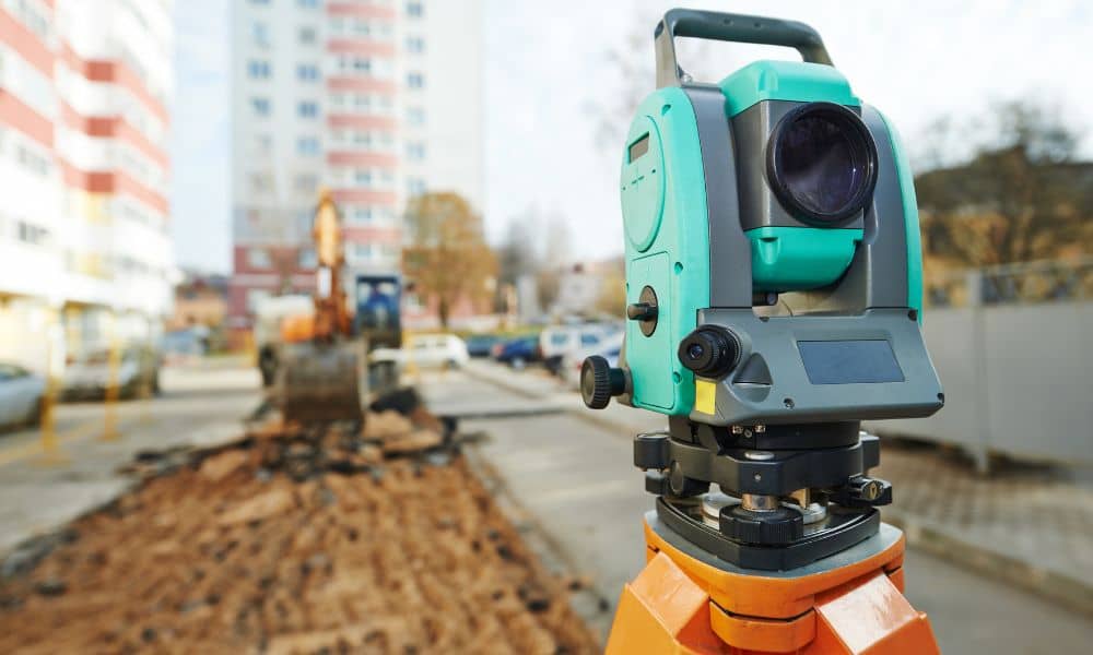 Total station at an urban construction site for construction staking and as-built surveying in Arlington, Virginia